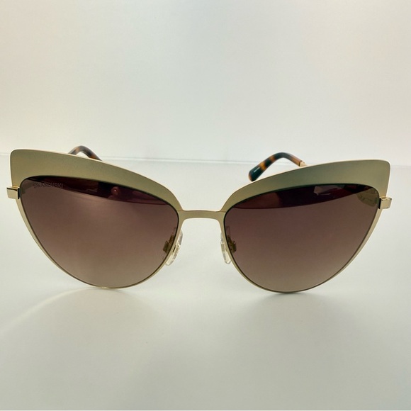Swarovski Accessories - NEW!!! Swarovski brown women sunglasses SK220 32G Authentic Retail 225$